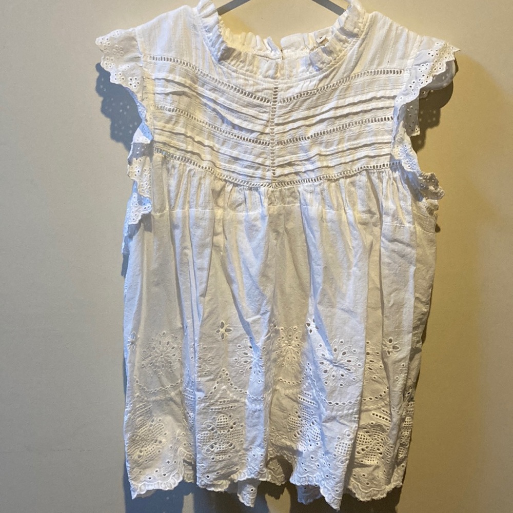 Eyelet peplum blouse